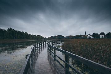 Fototapeta premium wooden bridge over river