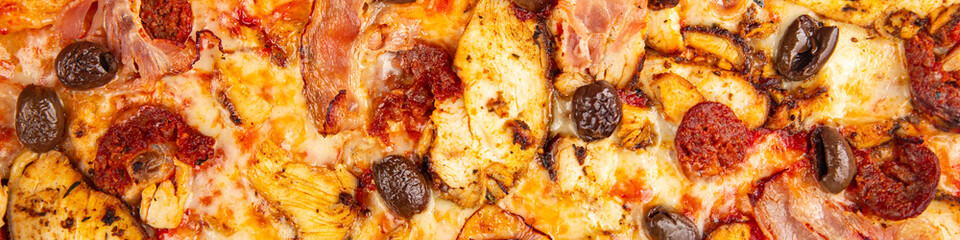 pizza chicken meat, sausages, olives, cheese, tomato sauce.fresh meal food snack on the table copy space food background rustic top view