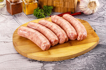 Raw meat sausages for grill