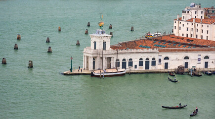 Aerial view from the Bell Tower (Campanile di San Marco) with islands, boats and gondolas in...