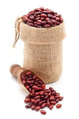 Close-up of Organic Red Kidney Beans or Rajma (Phaseolus vulgaris), in a jute bag and on a scoop,...