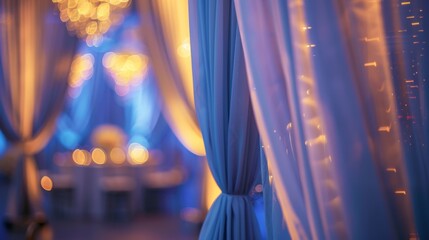 A beautifully decorated wedding venue features elegant draping and soft lighting, creating a romantic atmosphere for celebrating love