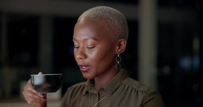 Black woman, office and drinking coffee at night with digital planning for paralegal case at law firm. Research, deadline and tea with professional and tech for online report with lawyer working