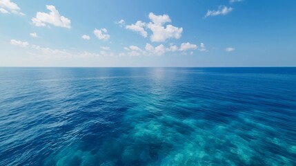 Fototapeta premium Ocean surface aerial view, sea with coral reef