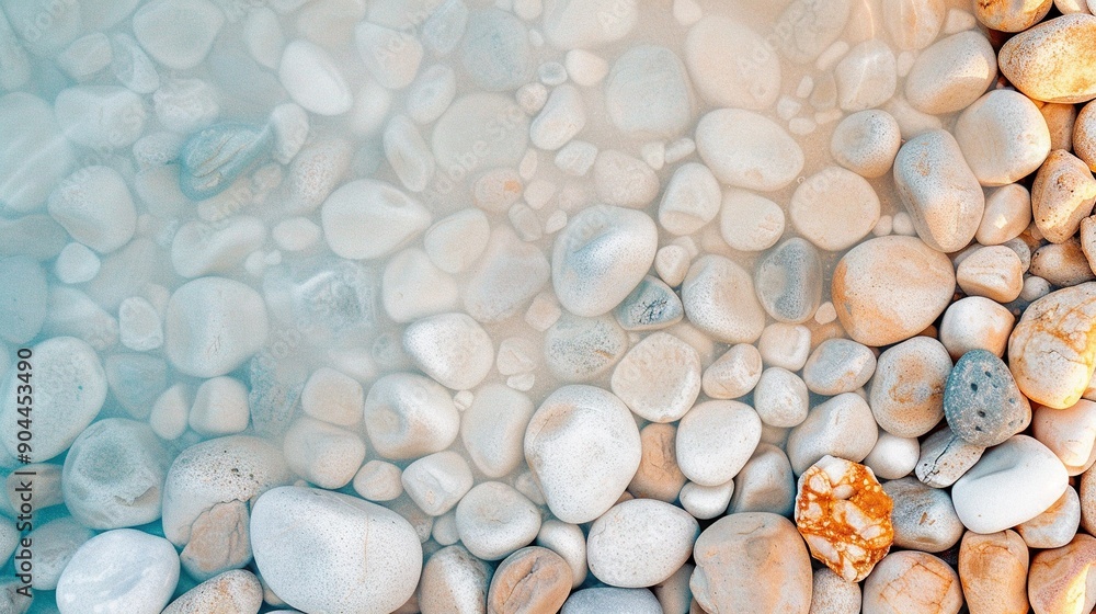 Poster a close-up of a cluster of rocks, with an orange object in the center, positioned to the right side 