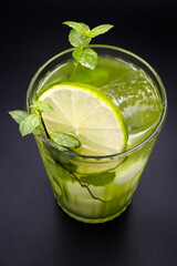 Cocktail with lime and alcohol
