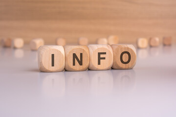 Wooden Blocks Arranged Artistically to Form the Word INFO in a Creative Presentation