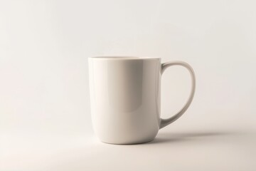 Fototapeta premium A simple yet elegant image of a glossy white mug with a handle, placed against a light background. The mug's smooth finish and classic design make it a timeless piece.