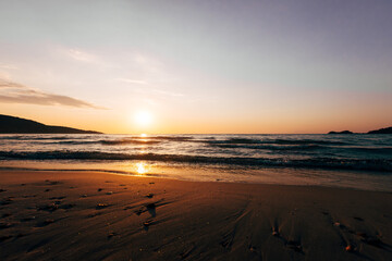 a sunset on the sea beach