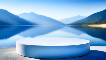 White Cylinder on Blue Lake with Mountains Background