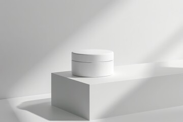 A minimalist white round container placed elegantly on a raised display block, casting soft shadows and illuminated by gentle natural light to create a serene ambiance.