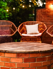 Fototapeta premium Rustic Wooden Table Top With Brick Base In A Cozy Outdoor Setting