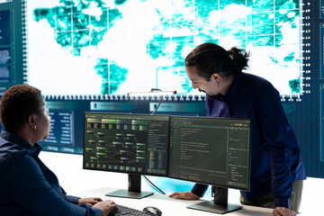 Group of governmental hackers using hacking tools to secure a network, focusing on cyber defense...