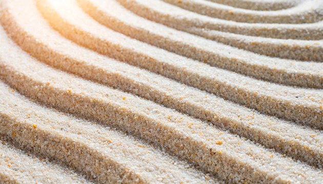 Lines drawing on sand, beautiful sandy texture. Spa background, concept for meditation and relaxation. Concentration and spirituality in Japanese zen garden. View from above.