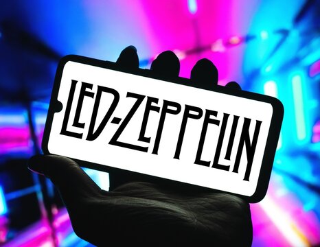 Photographic illustration of the Led Zeppelin logo is displayed on the screen of a smartphone. Umuarama July 30, 2024