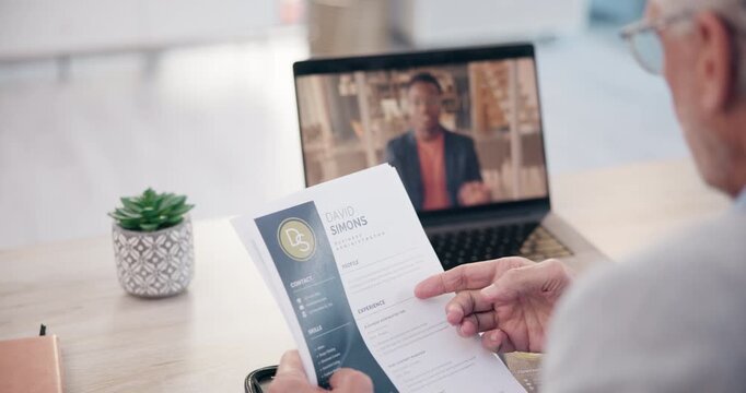 Businessman, cv or virtual interview in office with candidate, laptop or onboarding in company. Male manager, international recruitment or tech at desk for discussion, video call or hiring in firm