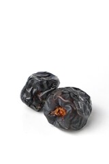 close up of ajwa dates isolated on white