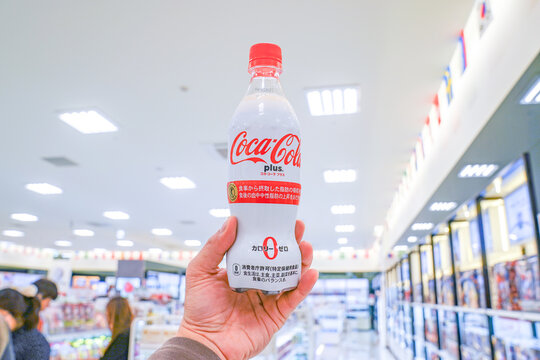 Osaka, Japan - 4 Mar 2018: Coca-Cola Plus is the no-calorie beverage contains five grams of indigestible dextrin, Sales at drinking water vending machine, around Japan.