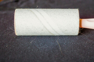 Lint roller for cleaning cat or dog hair stuck to clothes