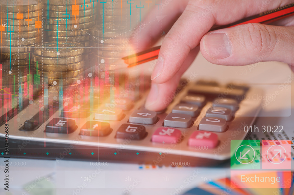 Poster closeup businessman hand using a calculator with pencil and blurred stacking of coins in concept of 