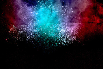 Multicolored Powder Explosion on Black Background, Red and Blue Dust Particles