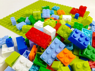 Various colored toy blocks on a white background. Educational toys for children