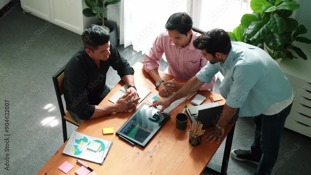 Poster top view of skilled project manager talking about financial graph to investors while sitting at meet