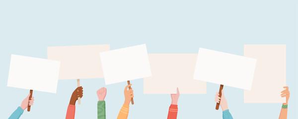 Hands hold blank protest placards, raised high in a demonstration. People united in protest and empowerment, showing support by holding hand with template signs that show their strength and solidarity
