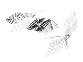 Fashion Silver Earrings with beautiful work detail is value. Luxury Silver diamond earring is fashion trend and fly in air. White background isolated