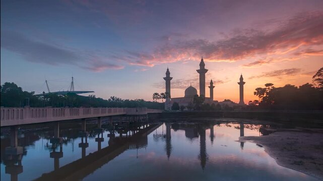 time lapse of a beautiful mosque in malaysia during sunrise