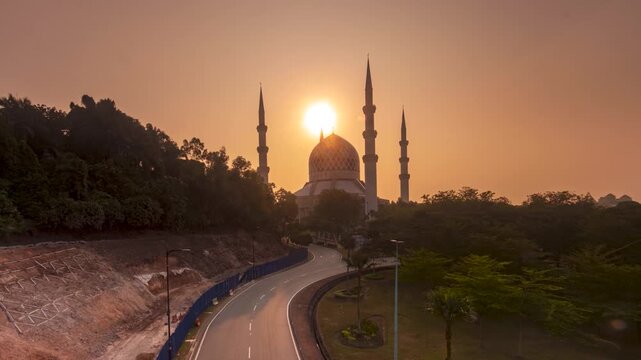 time lapse of a beautiful mosque in malaysia during sunrise