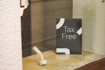 shop tax free text duty free shop sign on shop window 