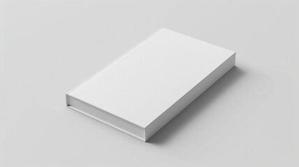 Neat pile of generic white books with no labels, against a plain background
