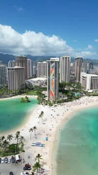 Duke Kahanamoku Beach Park and Lagoon with hotels and condos in the Waikiki area of Honolulu on Oahu, Hawaii. 