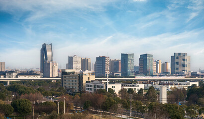 Modern Urban Skyline Under Blue Sky
