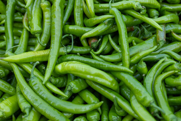 Many green and red hot chili peppers 