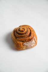 cinnamon roll in white background