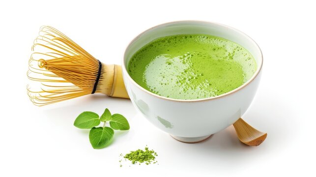 Steaming matcha tea in a simple cup, paired with a bamboo whisk, isolated on a white background with generous copy text space