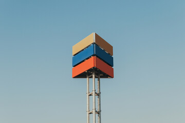 Urban colorful modern structure billboard with blue sky background