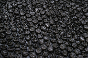 Close up photo of surface of black bubble wrap texture 