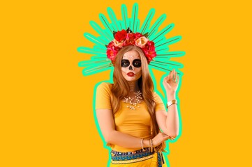 Beautiful young woman with painted skull on her face against yellow background. Celebration of Mexico's Day of the Dead (El Dia de Muertos)