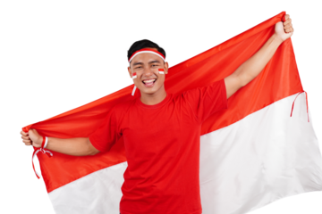 Indonesian man celebrating Indonesia's independence day on 17 August by holding the Indonesian flag isolated transparent
