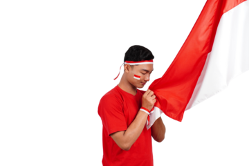 Indonesian man celebrating Indonesia's independence day on 17 August by holding the Indonesian flag isolated transparent
