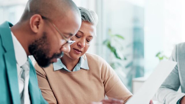 Business, people and discussion with documents in boardroom for feedback and report. Office, partners and explain with paperwork for agreement, terms and condition of contract with negotiation