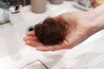 Struggles of Hair Loss. A Personal Journey confronting hair loss. Selective focus