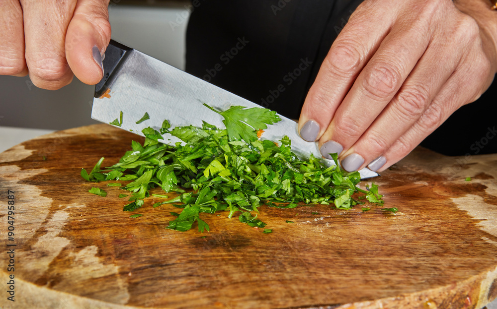 Sticker Chopping Fresh Parsley on Wooden Board