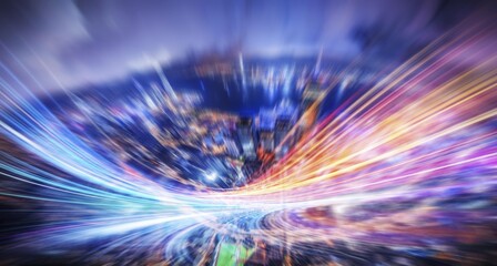 Abstract blurred lights create a sense of motion and energy, with a hint of cityscape in the background.