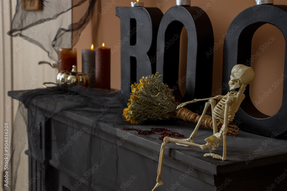 Wall mural Halloween skeleton and decor on mantelpiece in festive hallway