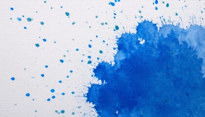 Blue watercolor splash art on a white drawing paper background