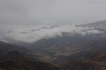 misty morning on the river fog in the mountains